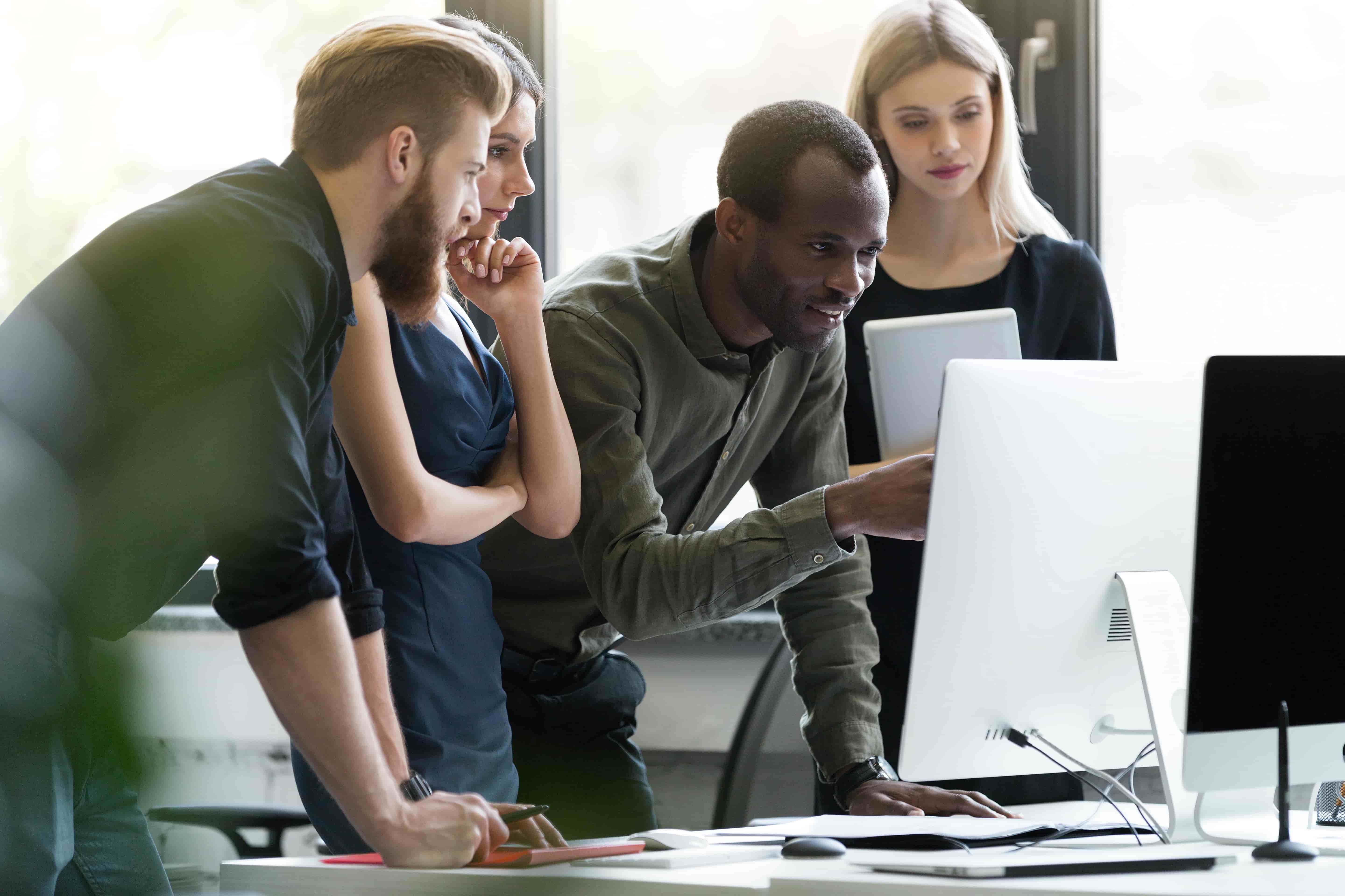 Team of Cyberpools cybersecurity professionals collaborating on security solutions